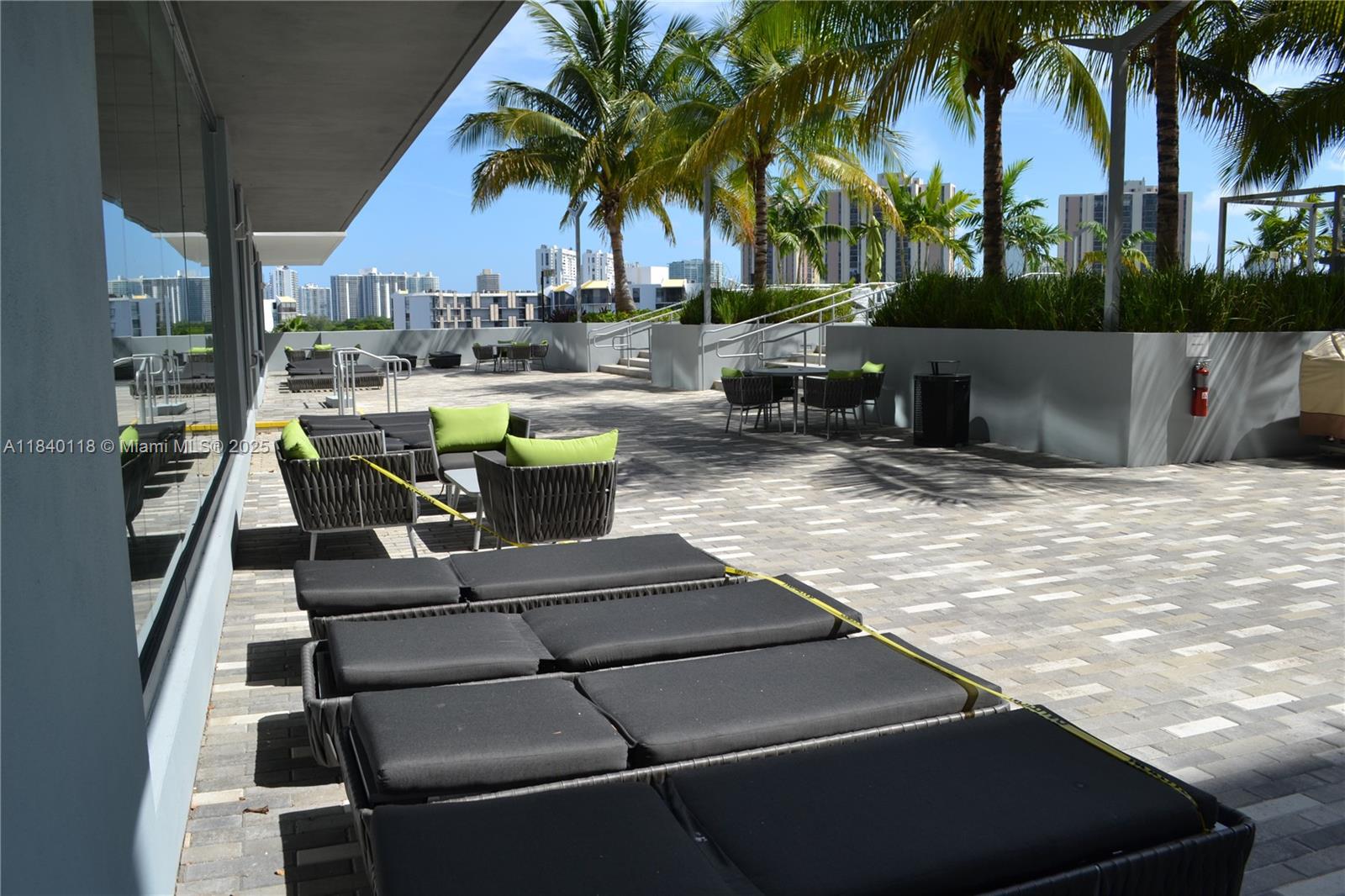 2960 Northeast 207th Street, Unit 1204 Aventura, FL 33180 - Photo 13 of 28 a view of outdoor space with seating area