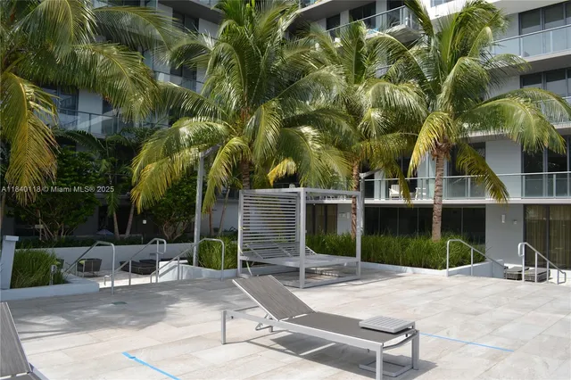 a view of a backyard with plants