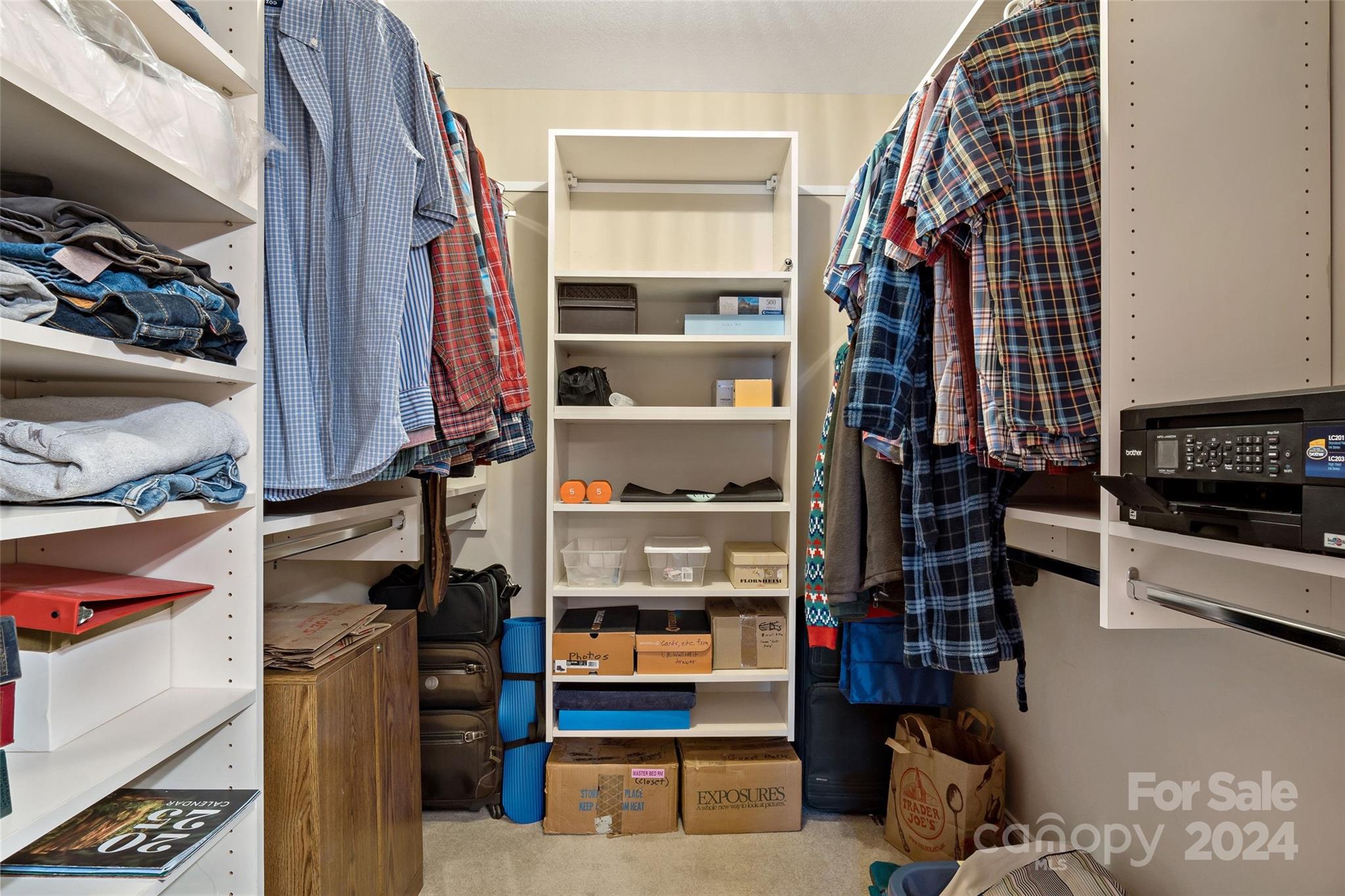 46 Outlook Circle Swannanoa, NC 28778 - Photo 25 of 36 a view of walk in closet with clothes and shoes