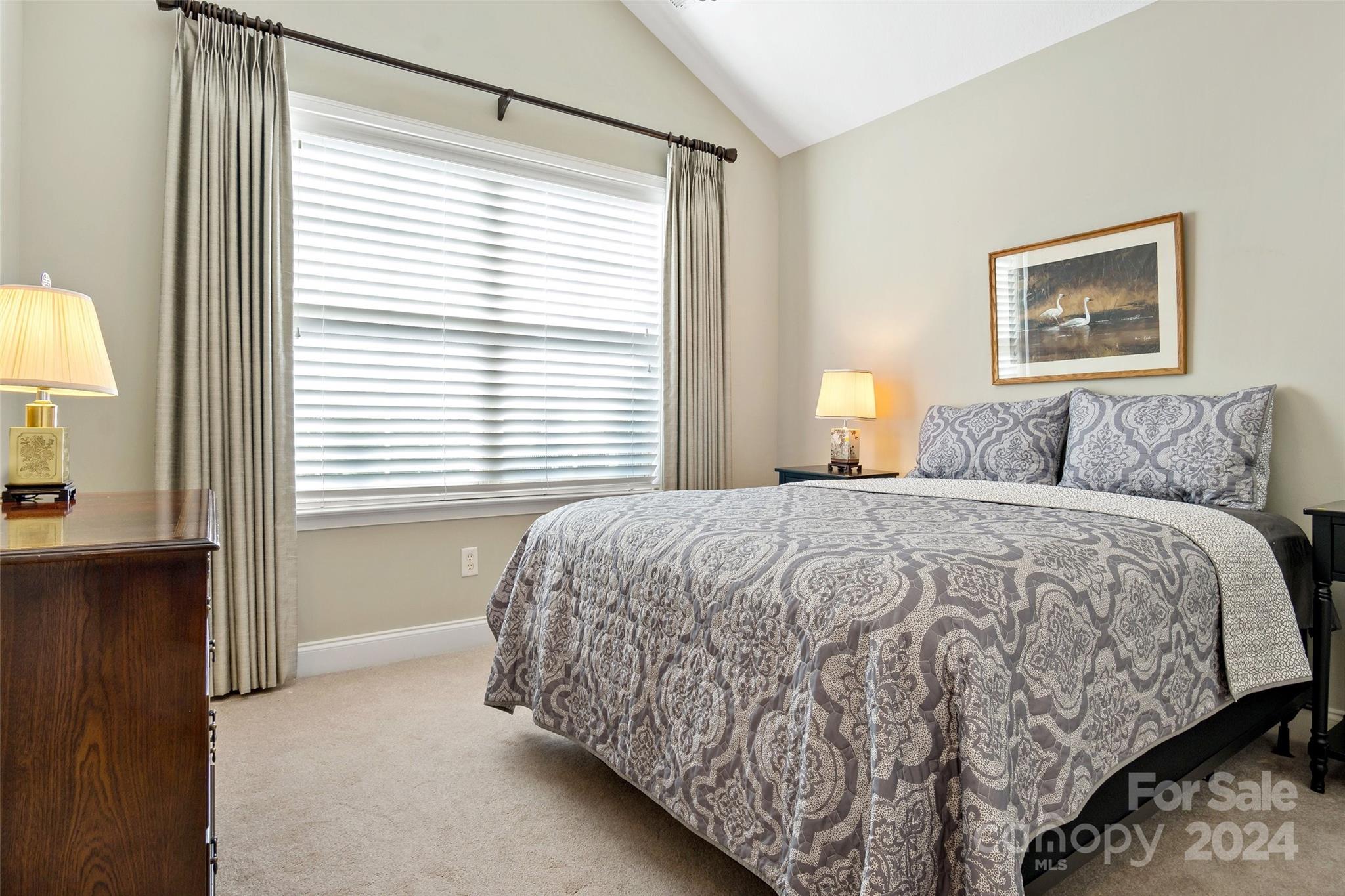 46 Outlook Circle Swannanoa, NC 28778 - Photo 27 of 36 a bedroom with a bed and a window