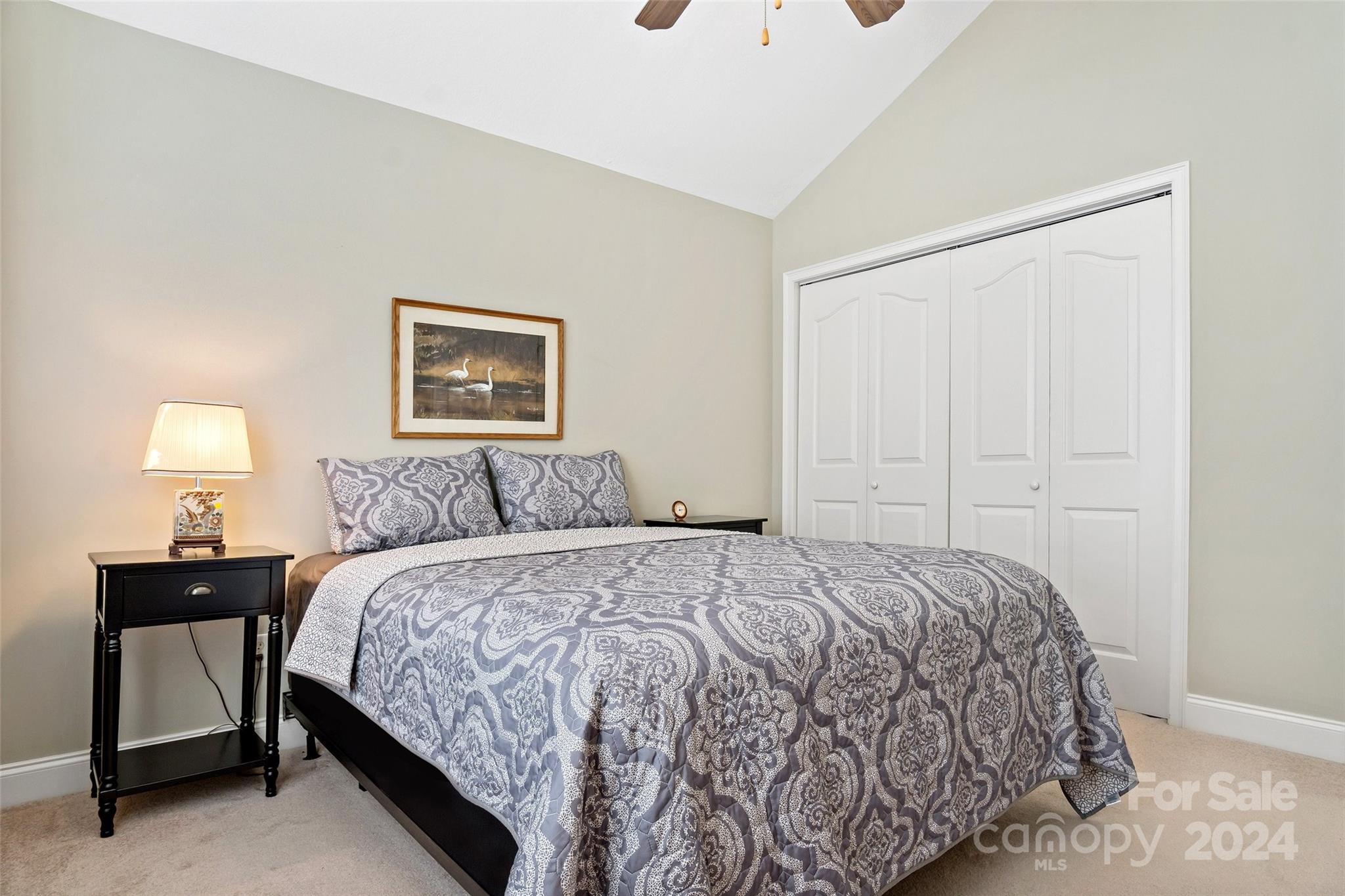46 Outlook Circle Swannanoa, NC 28778 - Photo 28 of 36 a bedroom with a bed and a painting