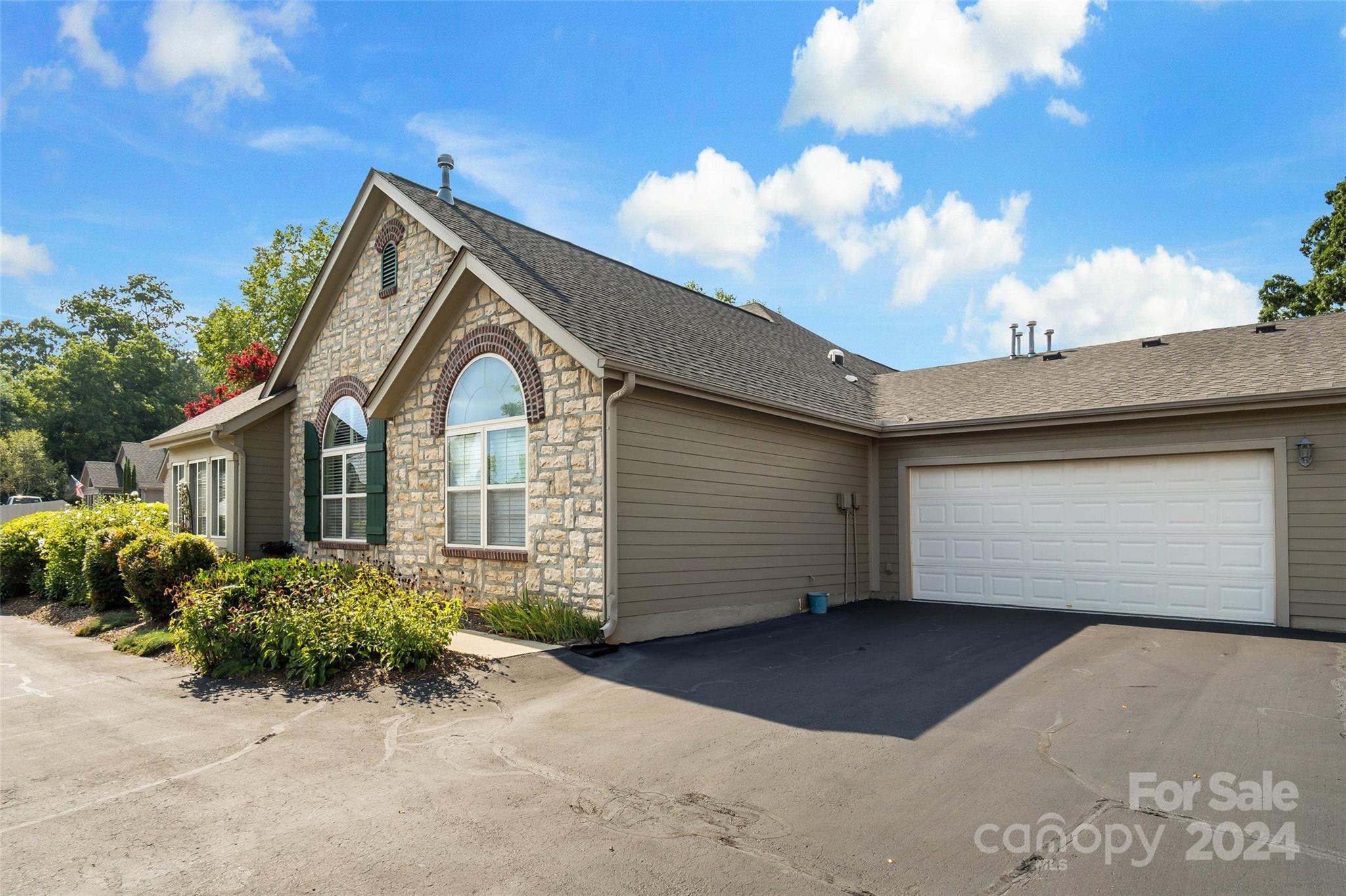 46 Outlook Circle Swannanoa, NC 28778 - Photo 3 of 36 a view of a house with a garage