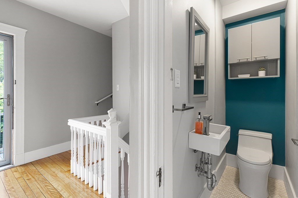 52-54 Gold Star Road Cambridge, MA 02140 - Photo 13 of 36 a living room with furniture and a wooden floor