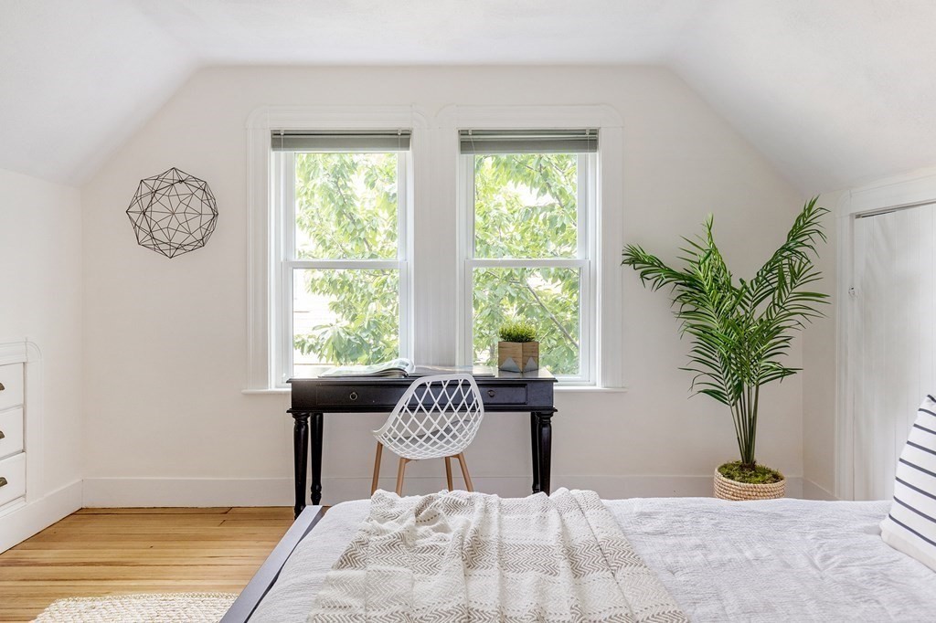 52-54 Gold Star Road Cambridge, MA 02140 - Photo 18 of 36 a view of a room with furniture and a potted plant