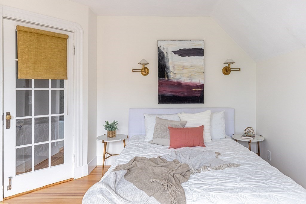 52-54 Gold Star Road Cambridge, MA 02140 - Photo 21 of 36 a bedroom with a bed and window