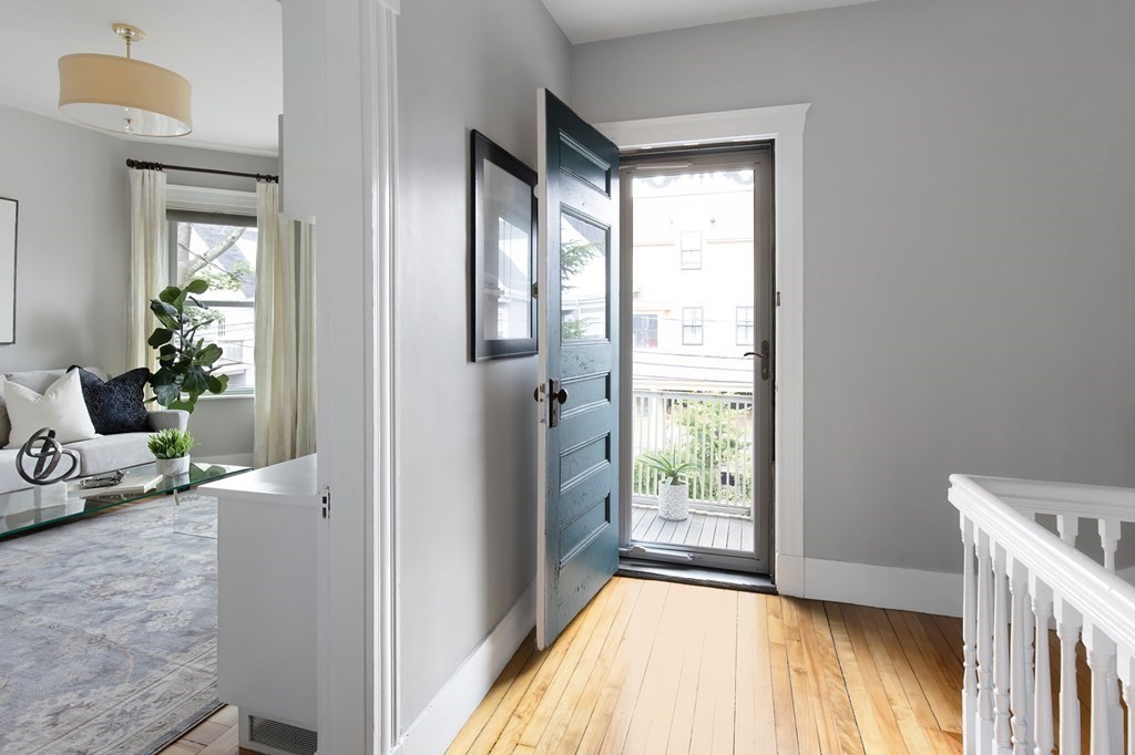 52-54 Gold Star Road Cambridge, MA 02140 - Photo 3 of 36 a view of livingroom with furniture and wooden floor