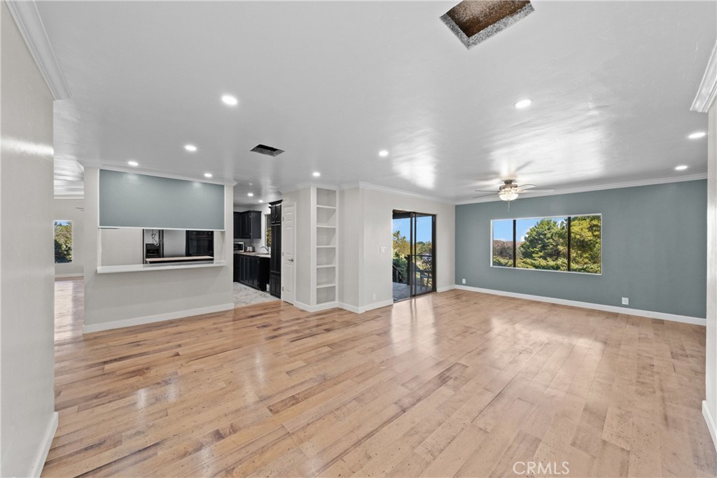22350 Gavilan Road Perris, CA 92570 - Photo 14 of 34 a view of kitchen with furniture and a refrigerator