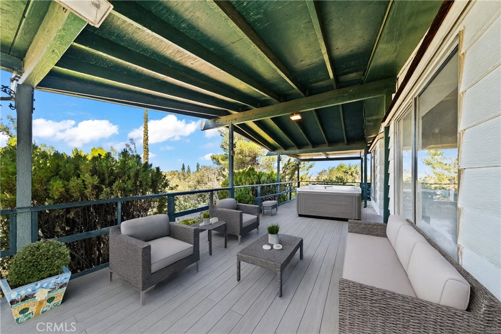 22350 Gavilan Road Perris, CA 92570 - Photo 18 of 34 a balcony with furniture and a potted plant