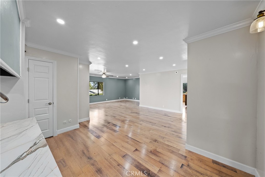 22350 Gavilan Road Perris, CA 92570 - Photo 6 of 34 a view of an empty room and wooden floor