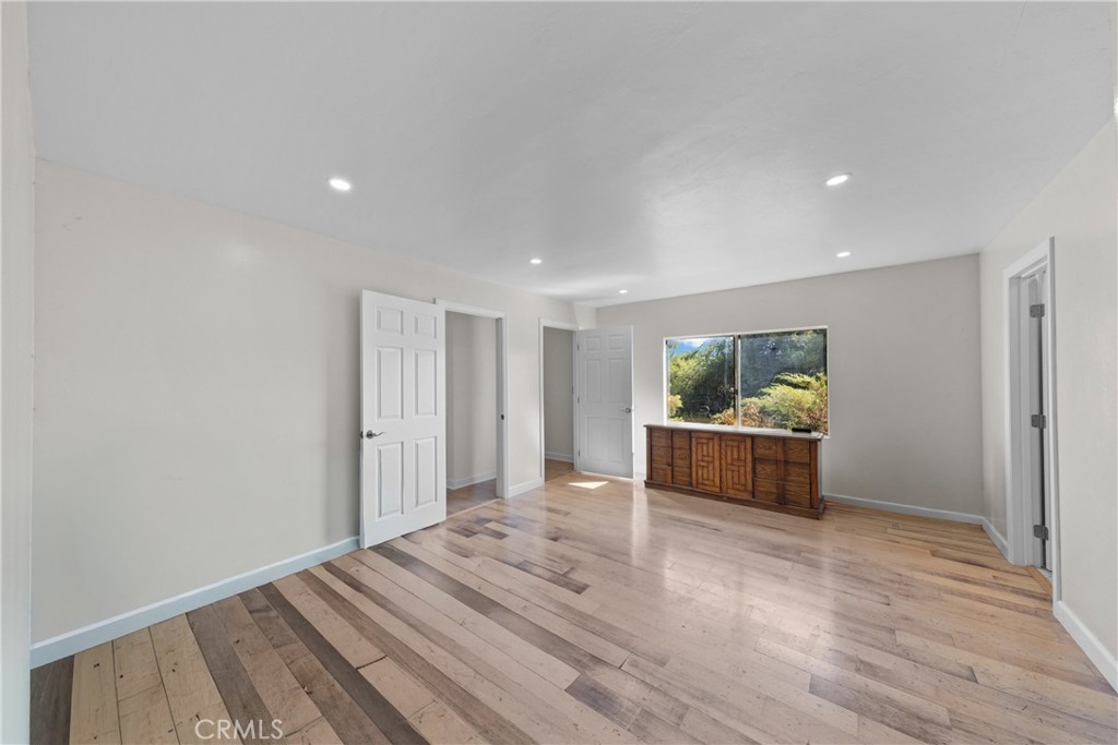 22350 Gavilan Road Perris, CA 92570 - Photo 9 of 34 a view of livingroom with furniture and wooden floor