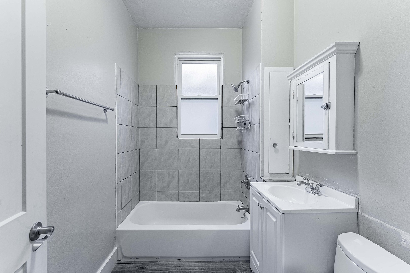 1330 Ridgeland Avenue Berwyn, IL 60402 - Photo 7 of 23 a bathroom with a sink a toilet and shower