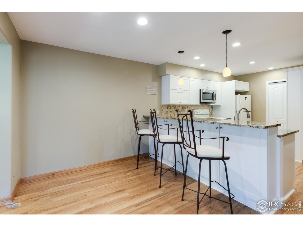 4477 Wellington Road Boulder, CO 80301 - Photo 15 of 36 Eat in Kitchen-Note Storage Cabinets below Counter