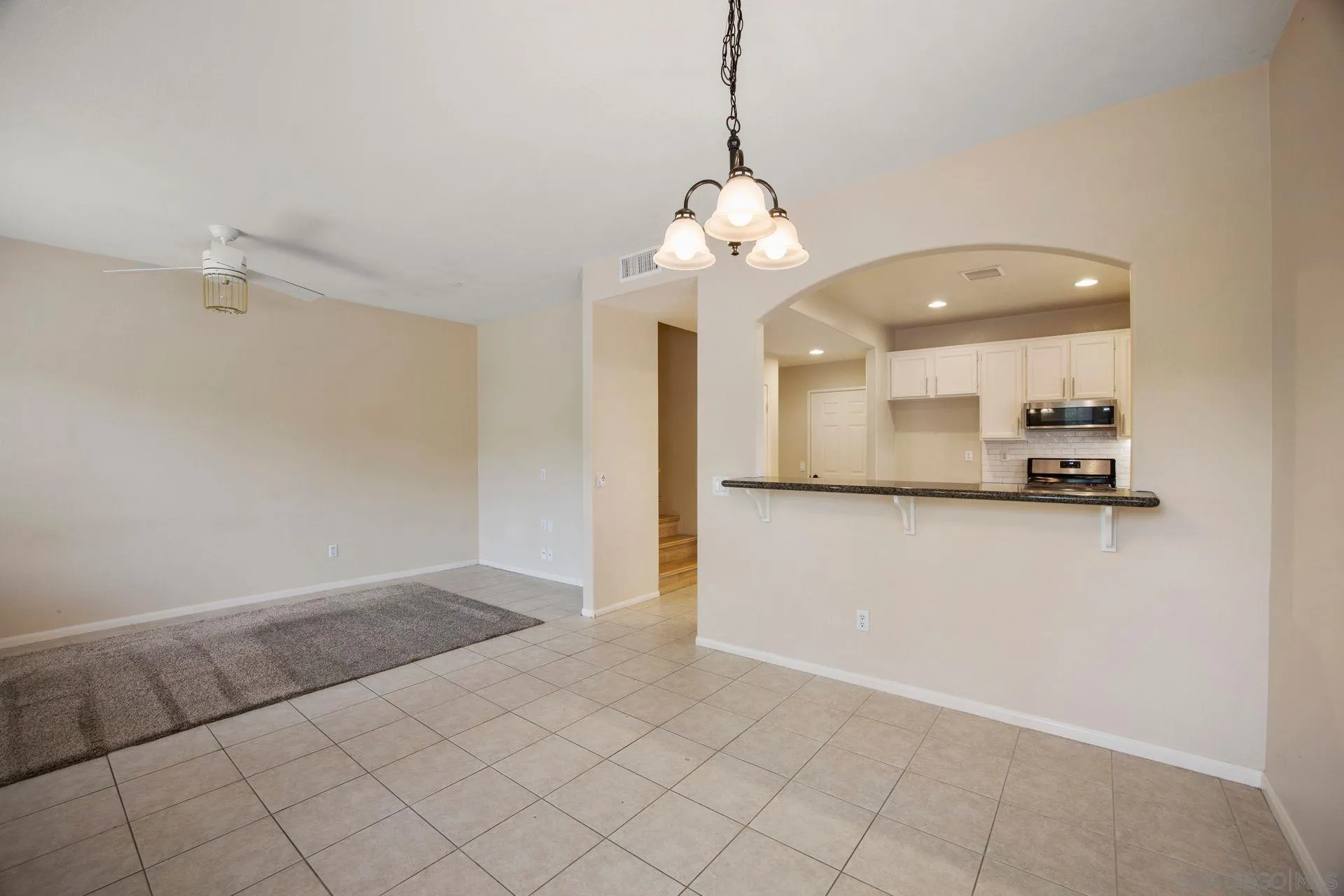 4058 Craven Road, Unit 53 Oceanside, CA 92057 - Photo 10 of 31 a view of a kitchen with a sink and dishwasher kitchen view