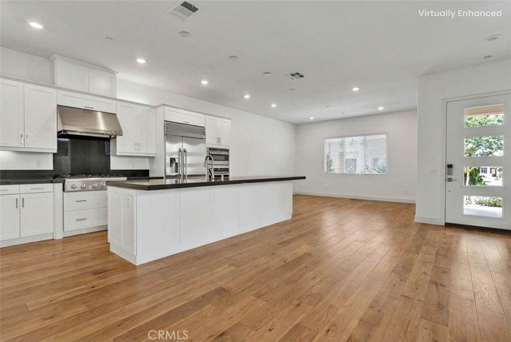 179 Terrapin Irvine, CA 92618 - Photo 12 of 46 What looks like when the floor is replaced by wood floor.