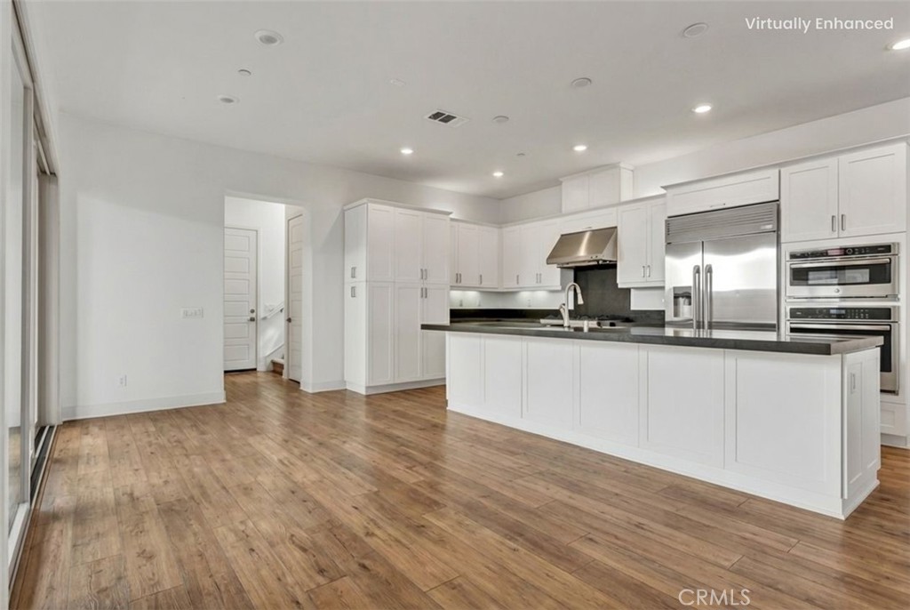 179 Terrapin Irvine, CA 92618 - Photo 2 of 46 What looks like when the floor is replaced by wood floor.