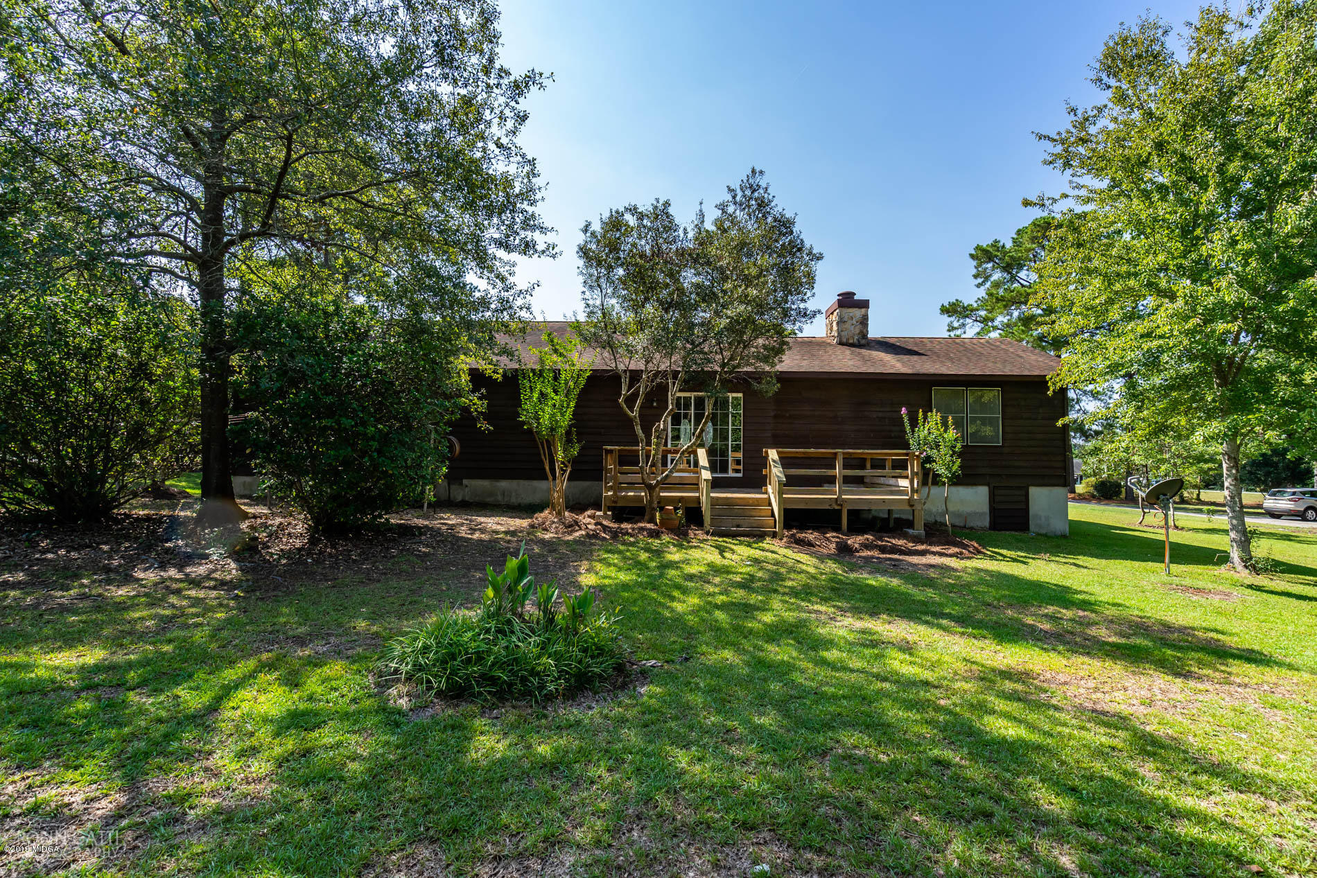 6251 Stapleton Road Macon, GA 31206 - Photo 21 of 21 a view of a house with backyard and a tree