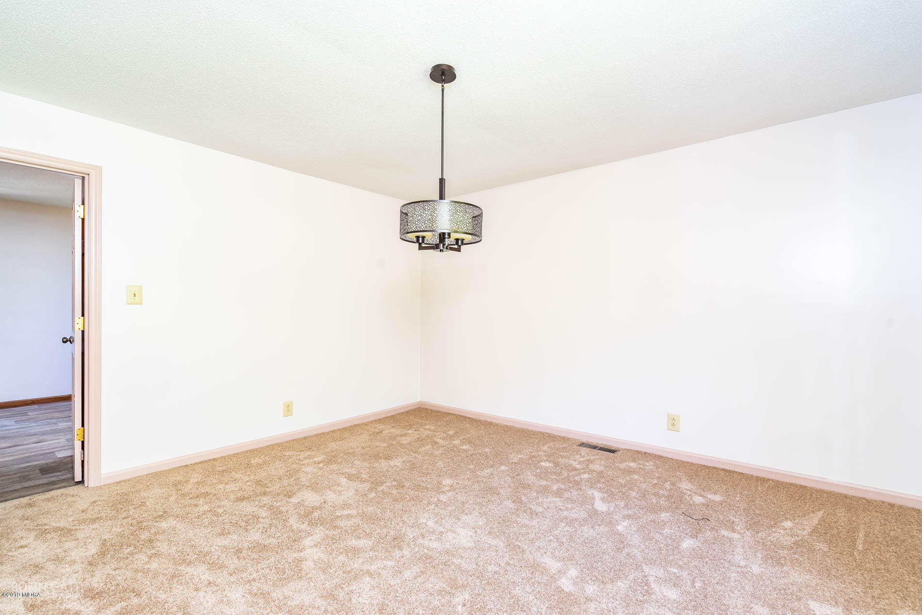 6251 Stapleton Road Macon, GA 31206 - Photo 6 of 21 a view of a room with a ceiling fan