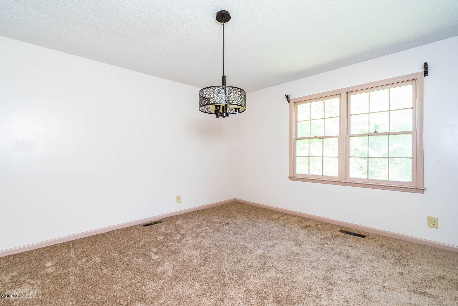 6251 Stapleton Road Macon, GA 31206 - Photo 7 of 21 a view of a room with window and ceiling fan
