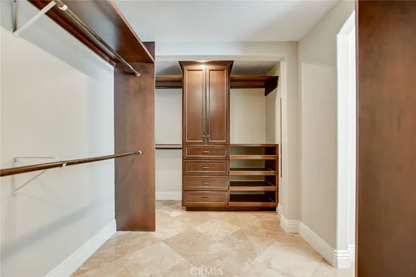 an aerial view of a house with garden space and street view