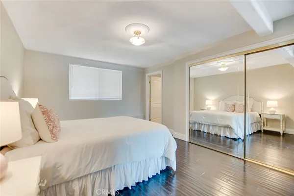 an aerial view of a house with a yard and garden