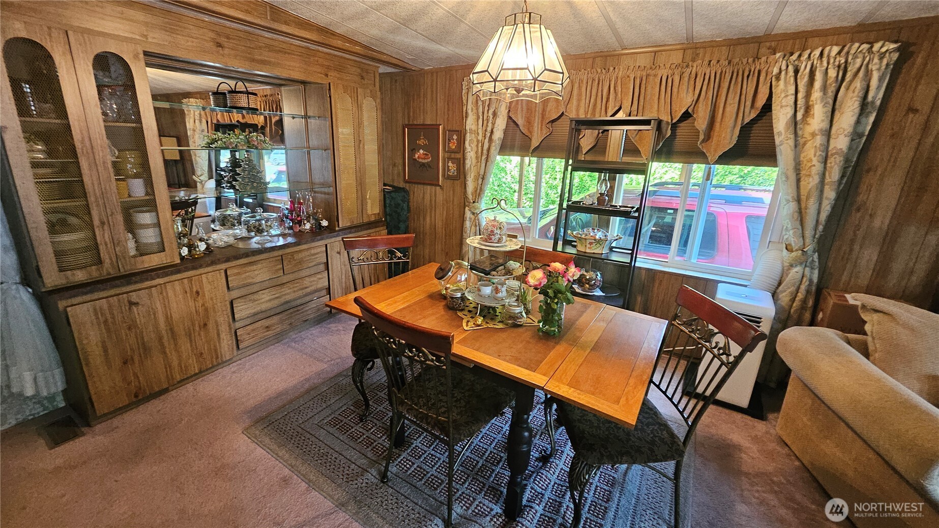5600 Mt Solo Road, Unit 161 Longview, WA 98632 - Photo 11 of 17 a view of a dining room with furniture window and outside view