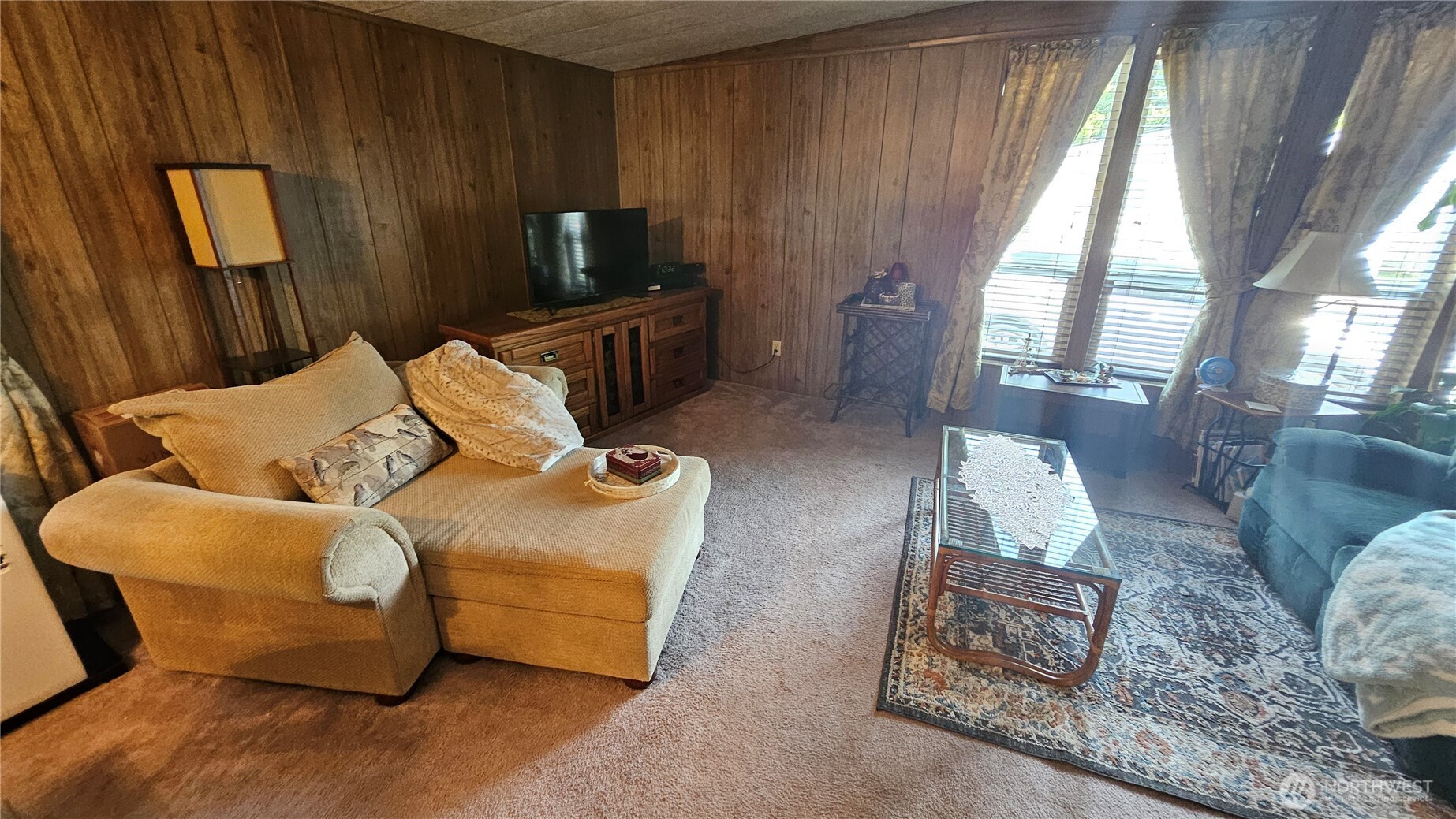 5600 Mt Solo Road, Unit 161 Longview, WA 98632 - Photo 12 of 17 a living room with furniture and a flat screen tv