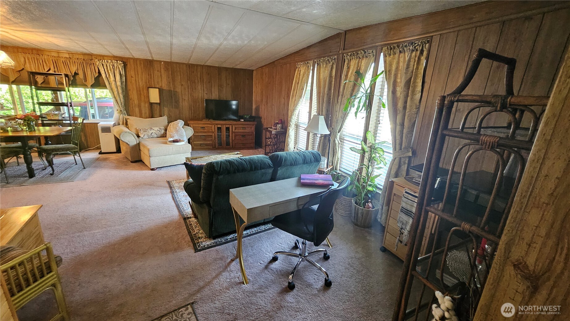 5600 Mt Solo Road, Unit 161 Longview, WA 98632 - Photo 14 of 17 a living room with furniture and a large window