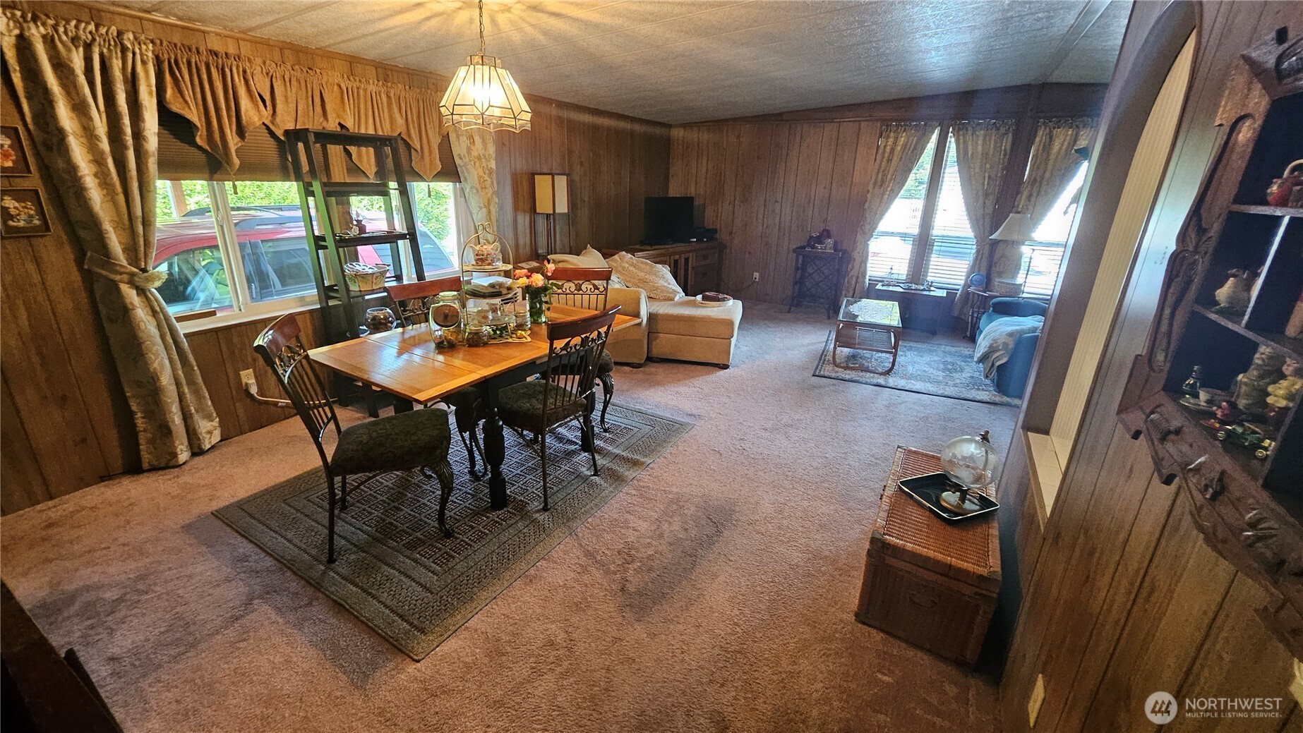 5600 Mt Solo Road, Unit 161 Longview, WA 98632 - Photo 10 of 17 a dining room with furniture a chandelier and window