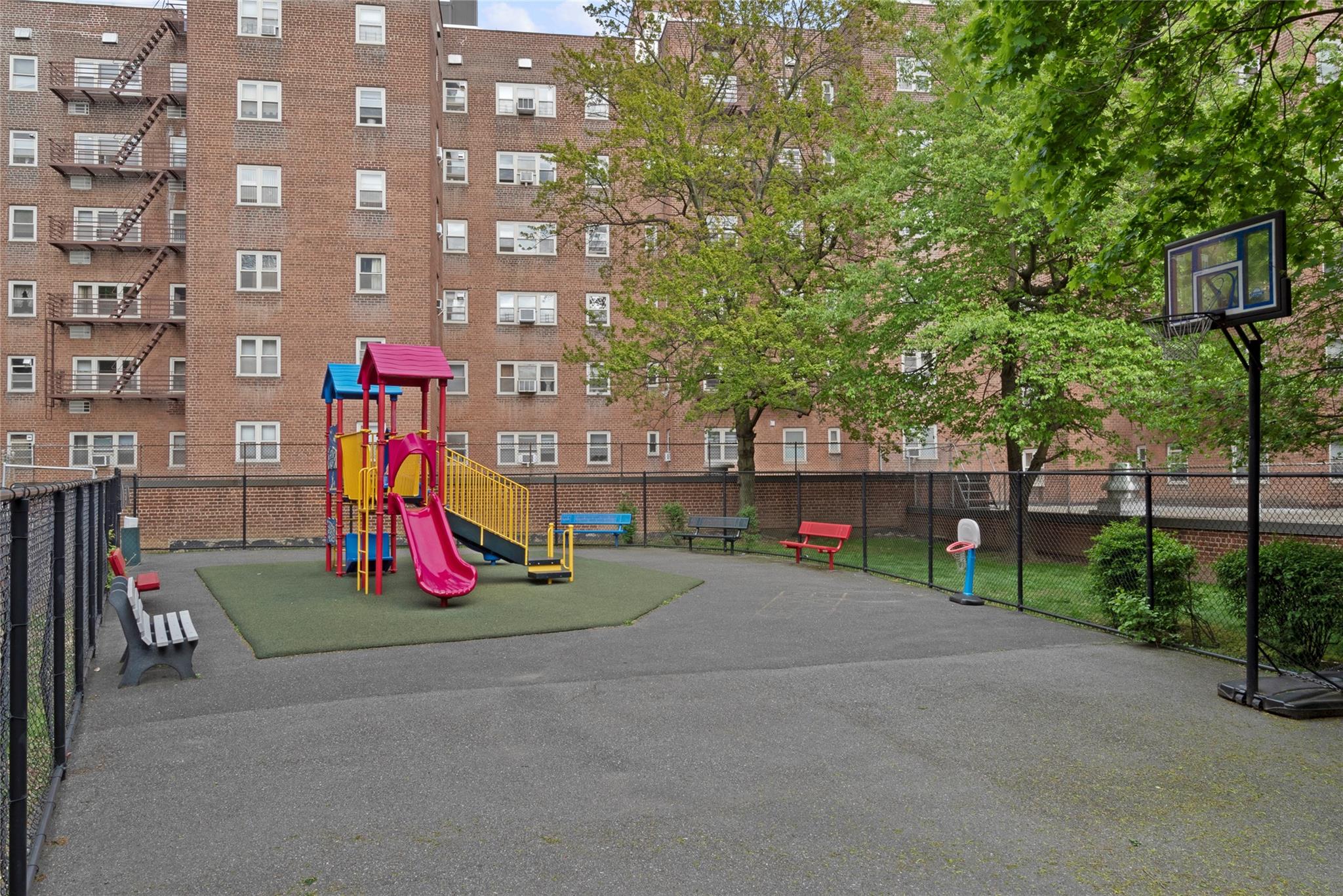 144-55 Melbourne Avenue, Unit 3J Queens, NY 11367 - Photo 13 of 13 Communal playground featuring fence