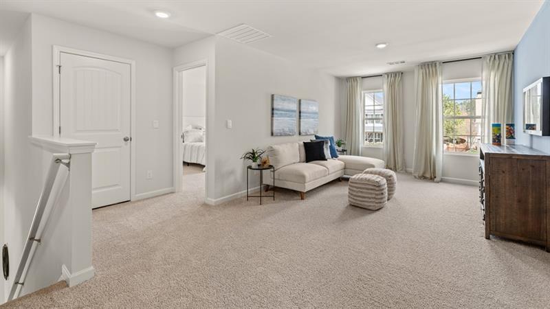 74 Buckthorn Way Dallas, GA 30132 - Photo 21 of 37 a living room with furniture and a window