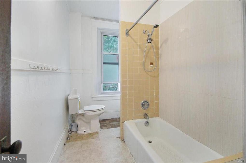 516 Carlton Avenue Bethlehem, PA 18015 - Photo 11 of 12 a bathroom with a toilet sink and shower