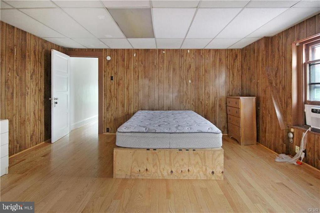 516 Carlton Avenue Bethlehem, PA 18015 - Photo 9 of 12 a view of a room with wooden floor and a window