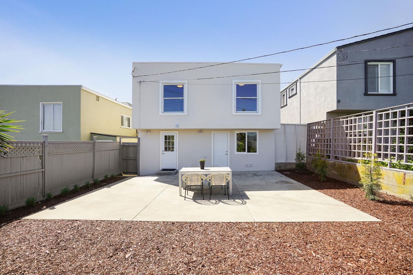 147 Morningside Drive Daly City, CA 94015 - Photo 27 of 29 a large bedroom with a bed and wooden floor