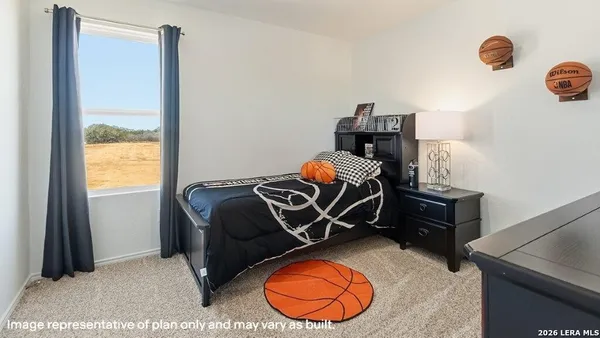 a room with furniture and a window