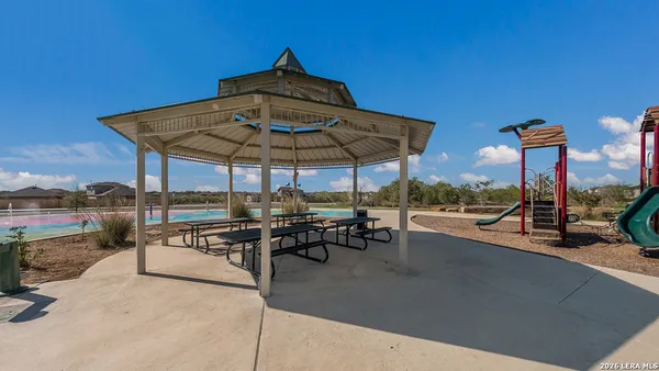 a view of a chairs and tables in the patio