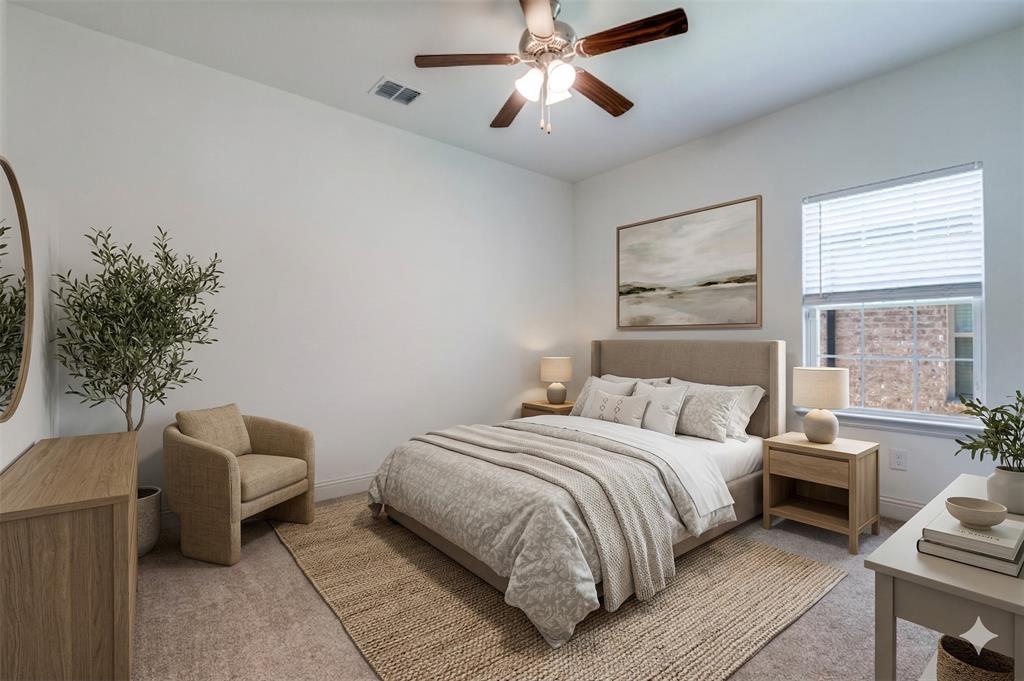 332 Braves Way Lavon, TX 75166 - Photo 12 of 24 a bedroom with a bed and a couch
