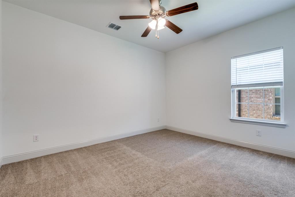 332 Braves Way Lavon, TX 75166 - Photo 13 of 24 a view of an empty room with a window