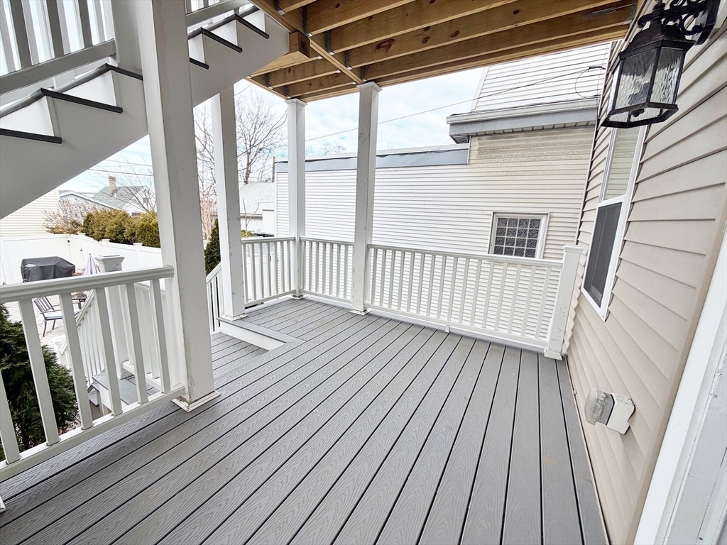 266 Lexington Street, Unit 1 Boston, MA 02128 - Photo 17 of 19 a view of deck with wooden floor