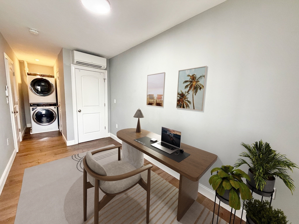 266 Lexington Street, Unit 1 Boston, MA 02128 - Photo 4 of 19 a workspace with furniture and window