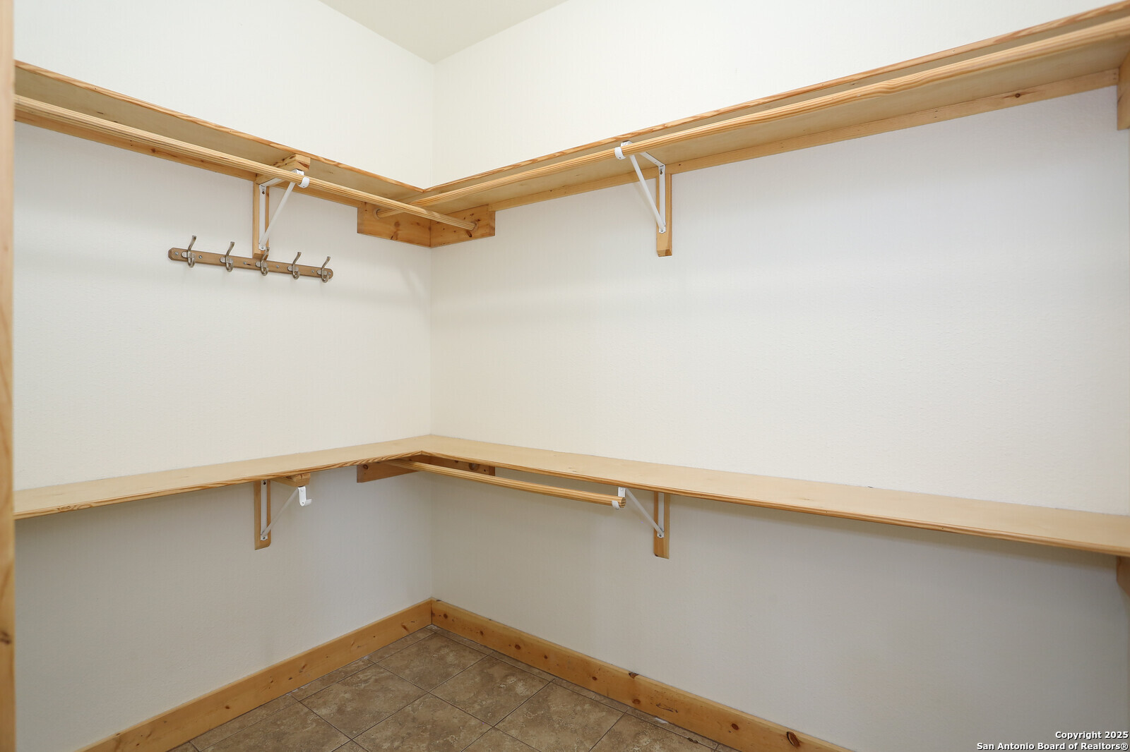 891 Hopkinsville Road Cuero, TX 77954 - Photo 13 of 36 a view of a room with racks on the wall