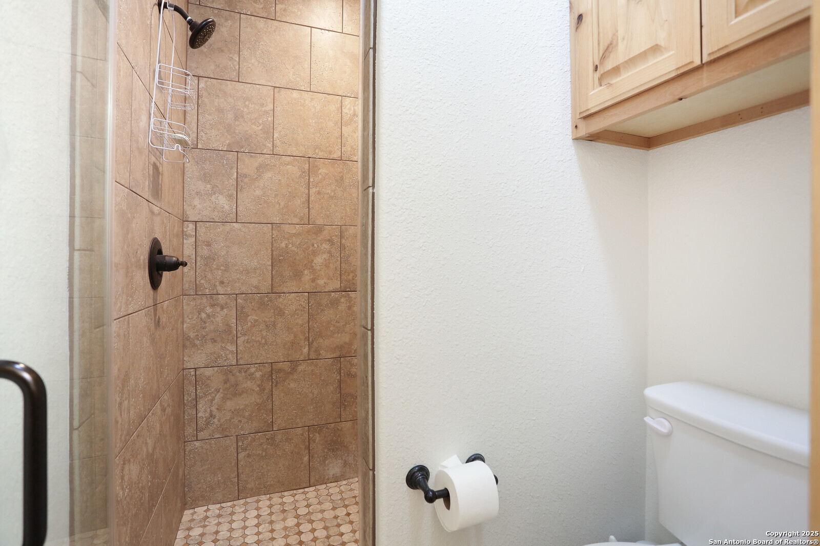 891 Hopkinsville Road Cuero, TX 77954 - Photo 17 of 36 a bathroom with a shower and toilet