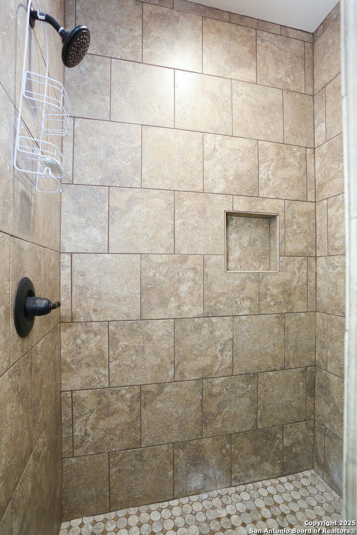 891 Hopkinsville Road Cuero, TX 77954 - Photo 18 of 36 a bathroom with a shower