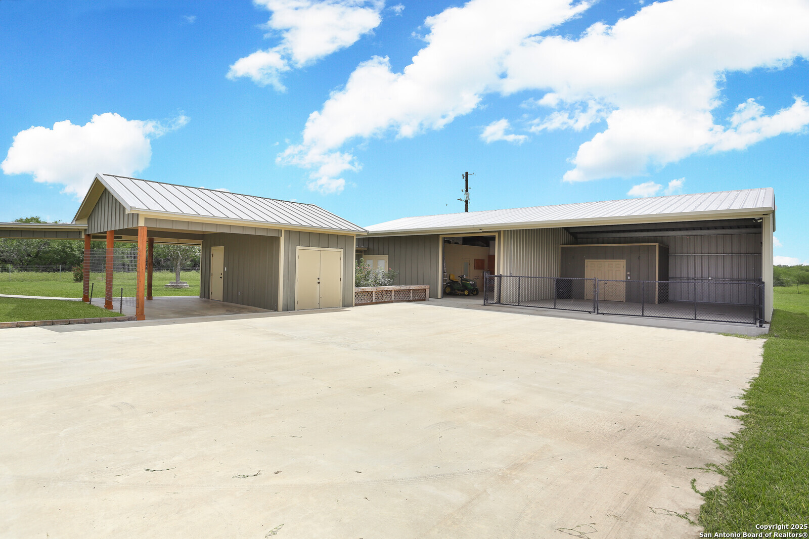 891 Hopkinsville Road Cuero, TX 77954 - Photo 21 of 36 a view of a house with a yard and potted plants