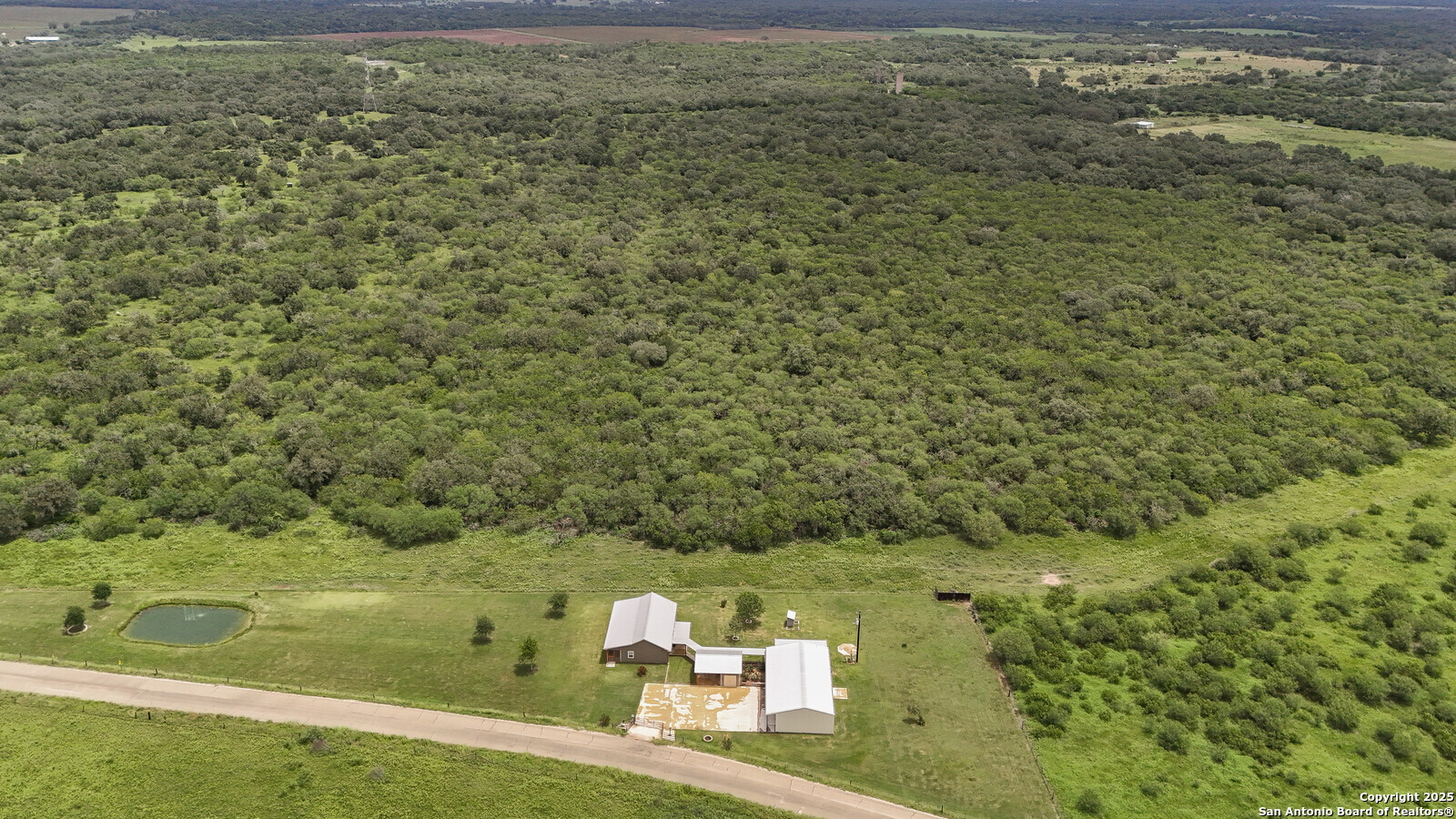 891 Hopkinsville Road Cuero, TX 77954 - Photo 30 of 36 a view of a field with an outdoor space