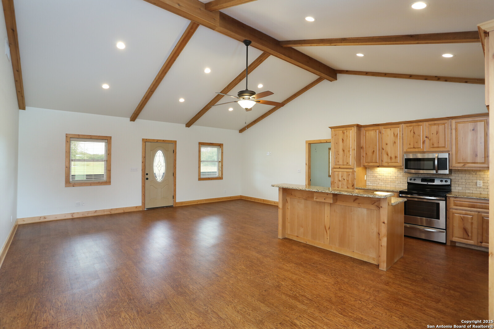 891 Hopkinsville Road Cuero, TX 77954 - Photo 4 of 36 a view of a kitchen with stove and cabinets