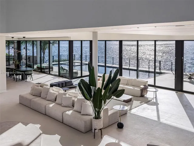 a view of swimming pool with seating space and deck