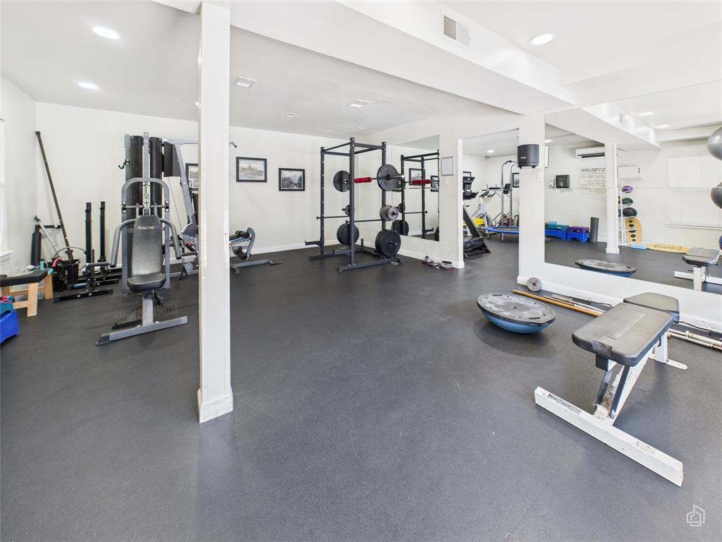 2020 South Congress Avenue, Unit 1209 Austin, TX 78704 - Photo 13 of 16 a view of a room with gym equipment