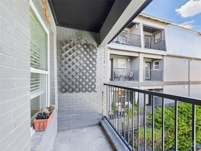 a view of a balcony with door