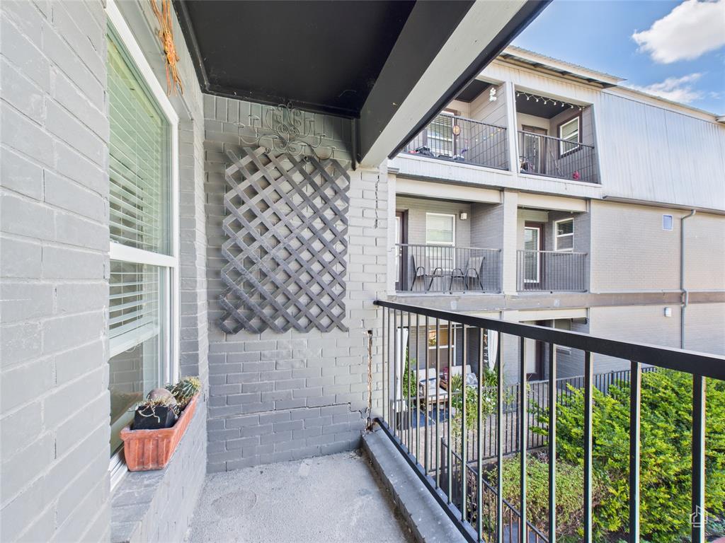 2020 South Congress Avenue, Unit 1209 Austin, TX 78704 - Photo 9 of 16 a view of a balcony with door