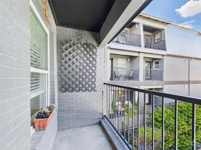 a view of a balcony with door
